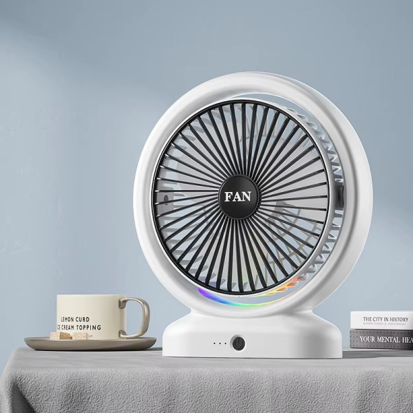 Small fan with visible brand logo in a room setting